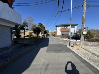 �É����c���S���쒬���J���O����1156-9�̐V�z��ˌ��Ă̑O�ʓ��H�܂ތ��n�ʐ^
